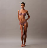 Calvin Klein CK INSTINCT Womens Bikinis Vintage Pink front view on model, showcasing the delicate design and fit.