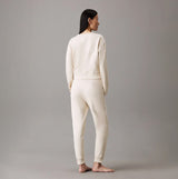 Calvin Klein TONAL LOGO LOUNGE Womens Joggers Sandshell back view, showing soft cotton fabric and comfortable fit.