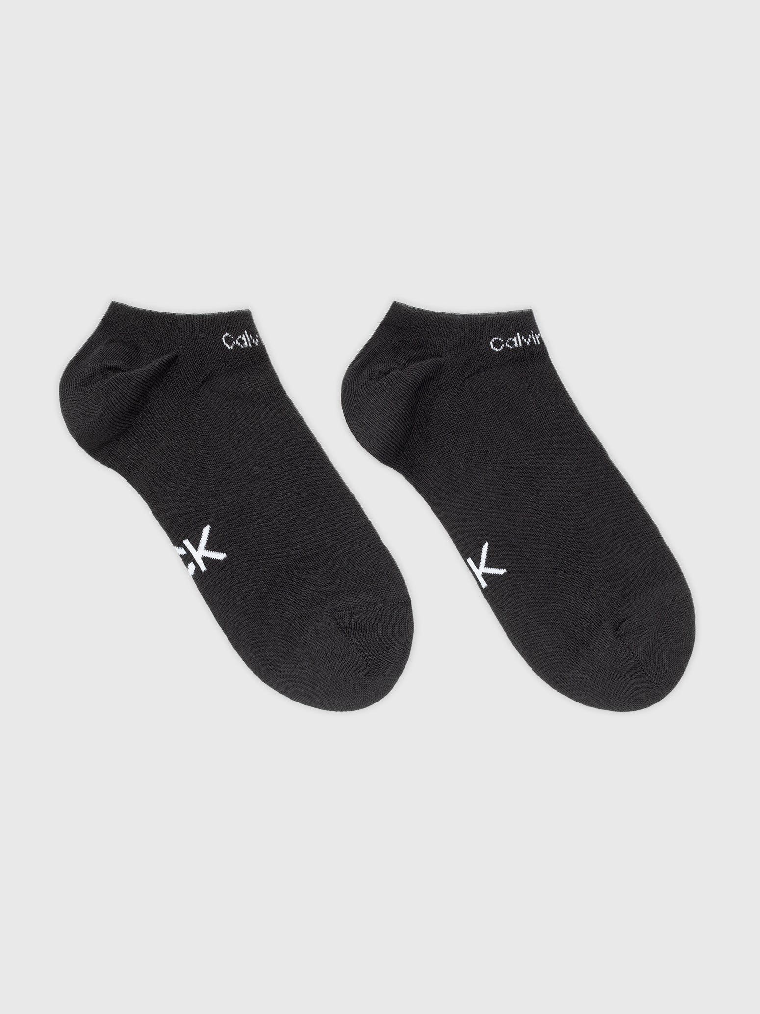 Calvin Klein 2 Pack Womens Ankle Trainer Socks Black front view showcasing two pairs with logo detail.