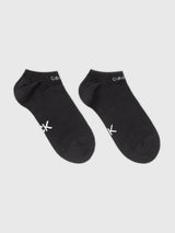 Calvin Klein 2 Pack Womens Ankle Trainer Socks Black front view showcasing two pairs with logo detail.