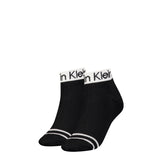 Calvin Klein 2 Pack Womens Ankle Trainer Socks Black side view showcasing the sleek black design and signature logo.