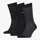 Calvin Klein 3 Pack Giftboxed Logo Mens Crew Socks Black front view showcasing three pairs in black with logo designs.