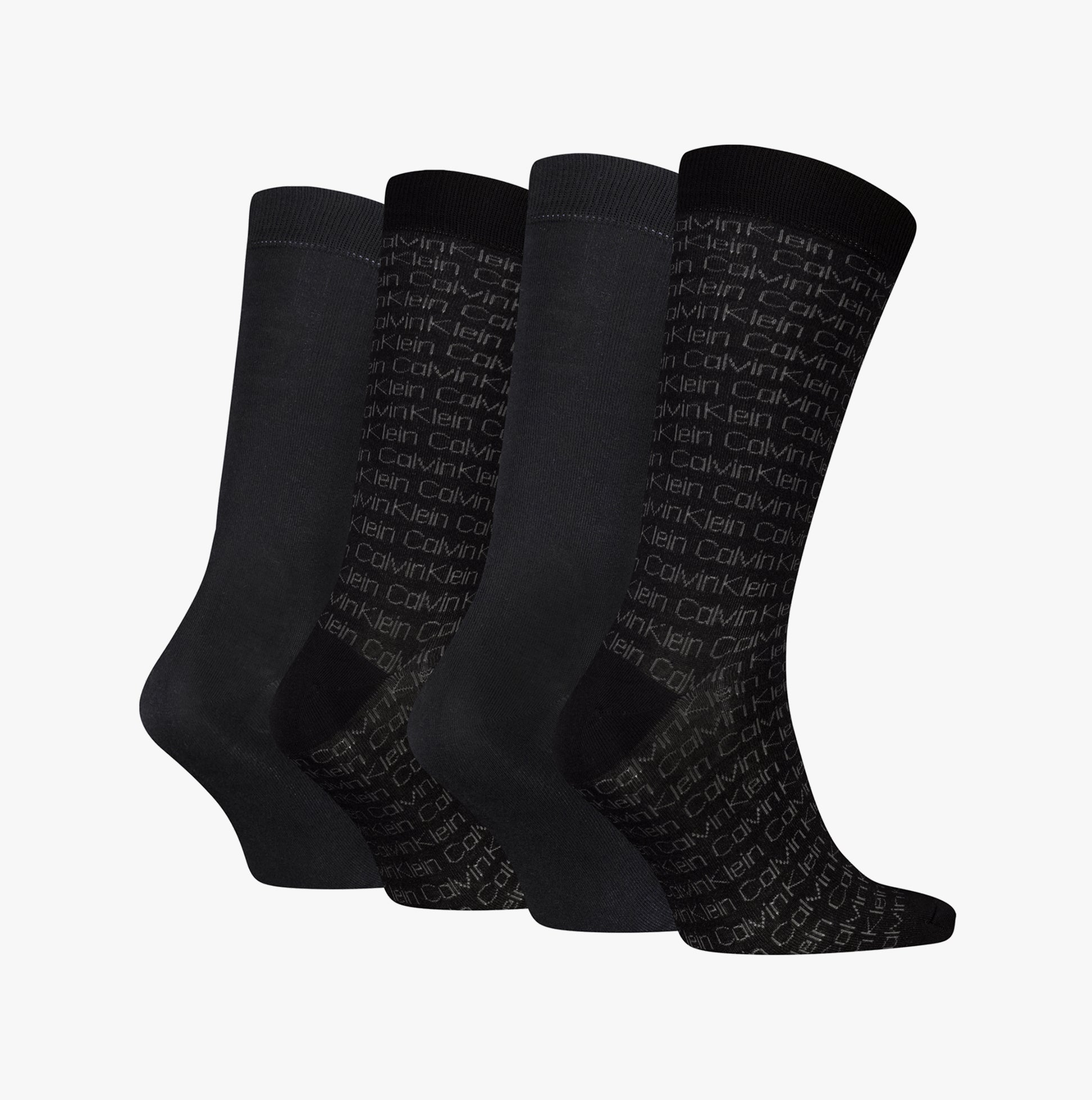 Calvin Klein 4 Pack Giftbox AOP Mens Socks Black front view showing four different styles of black socks.