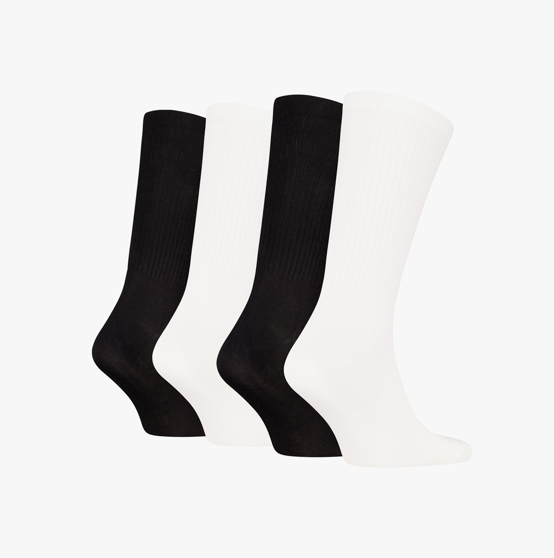 Calvin Klein 4 Pack Giftbox Monologue Mens Socks White/Black displayed in front view, featuring two black and two white socks.