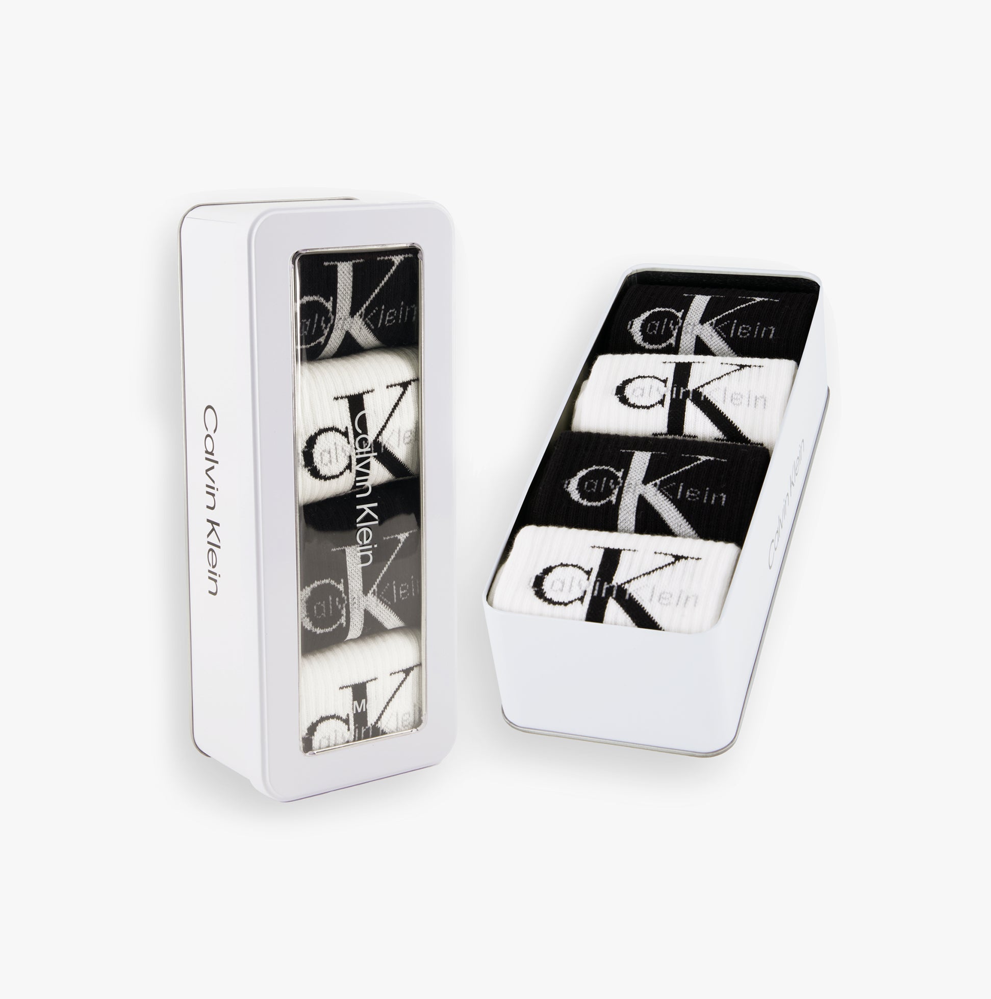 Calvin Klein 4 Pack Giftbox Monologue Mens Socks White/Black displayed in a gift box showing white and black socks.