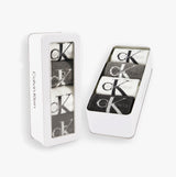 Calvin Klein 4 Pack Giftbox Monologue Mens Socks Grey Melange/White displayed in a stylish gift box with clear lid.