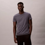 Calvin Klein S/S CREW NECK 3 PACK Mens T-Shirts & Tank Tops Multicoloured front view of a model wearing a grey t-shirt.