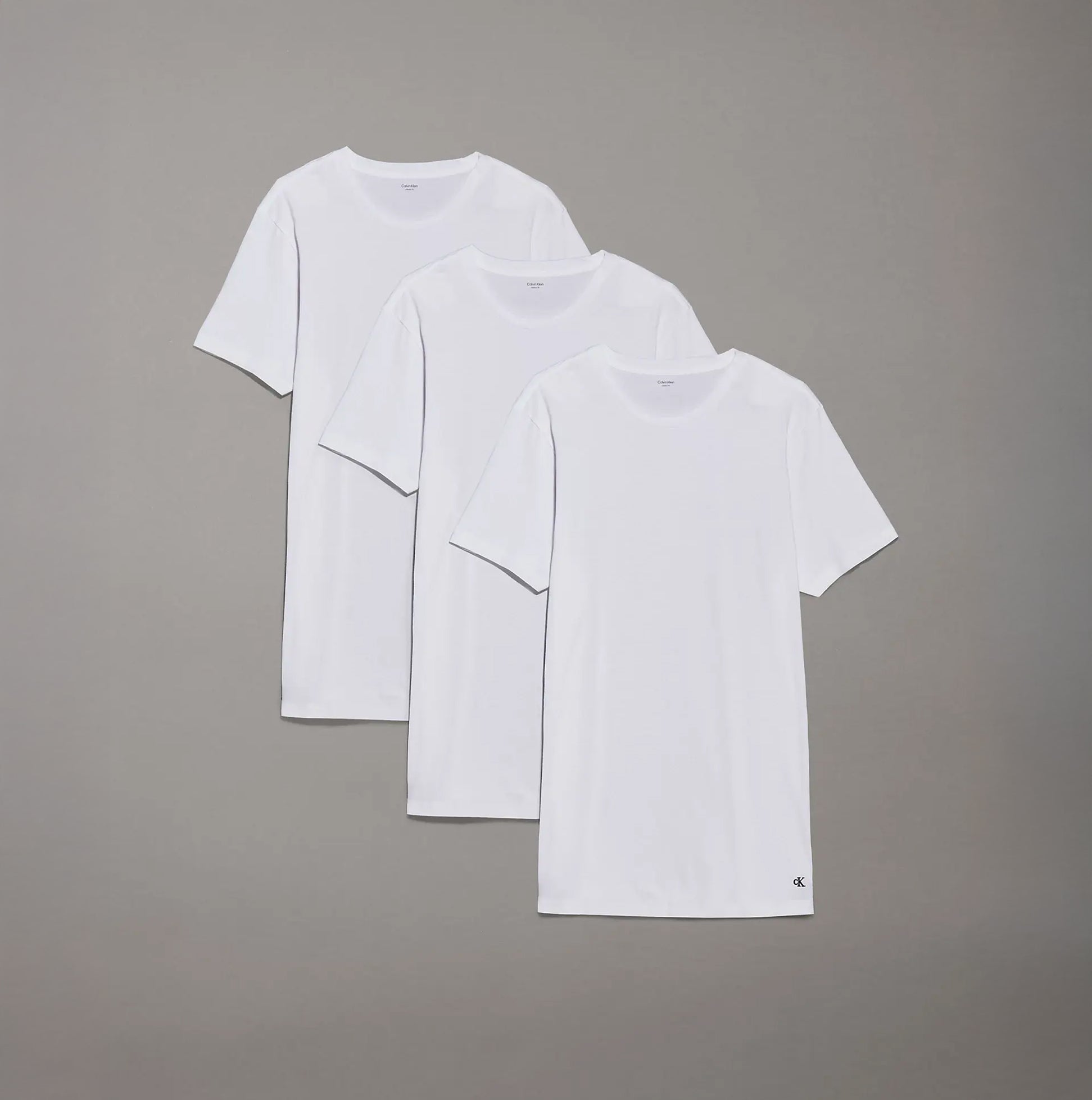 Calvin Klein 100% COTTON 3 Pack Mens T-Shirts White front view showing three white crew neck t-shirts stacked.