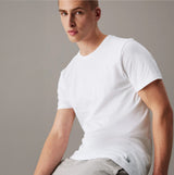 Calvin Klein 100% COTTON 3 Pack Mens T-Shirts White front view, model wearing white crew neck t-shirt, CK embroidery at hem.