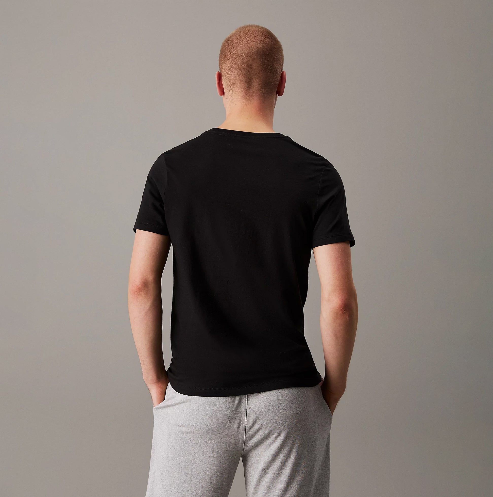 Calvin Klein 100% COTTON 3 Pack Mens T-Shirts Black/Grey Heather/White - Back view of black t-shirt on model.