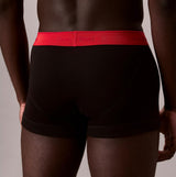 Calvin Klein TRUNK Mens 5 PACK Multicoloured back view showcasing black underwear with red waistband.