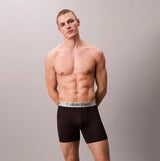 Calvin Klein LV00NB4124 BOXER BRIEF 3 PACK Mens Low Rise Trunks Multicoloured front view model wearing black trunks.