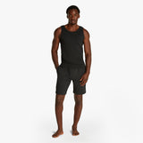 Calvin Klein 3 Pack Mens Lounge Tank Tops Black front view model wearing black tank top with shorts.