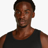 Calvin Klein 3 Pack Mens Lounge Tank Tops Black front view on model showcasing fit and comfort of cotton blend material.