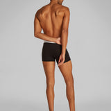 Calvin Klein COTTON 3 Pack Mens Trunks Black back view on model, featuring medium rise waist and CK signature elastic waistband.