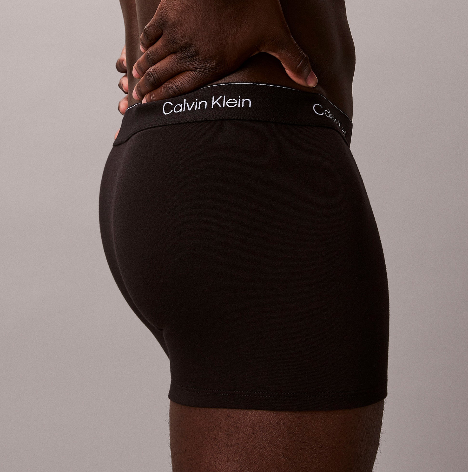 Calvin Klein RELAXED FIT Mens 3 Pack Trunks Multicoloured side view showcasing soft fabric and signature waistband.