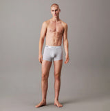 Calvin Klein TRUNK 3 Pack Mens Multicoloured front view on model wearing grey trunks with logo waistband.