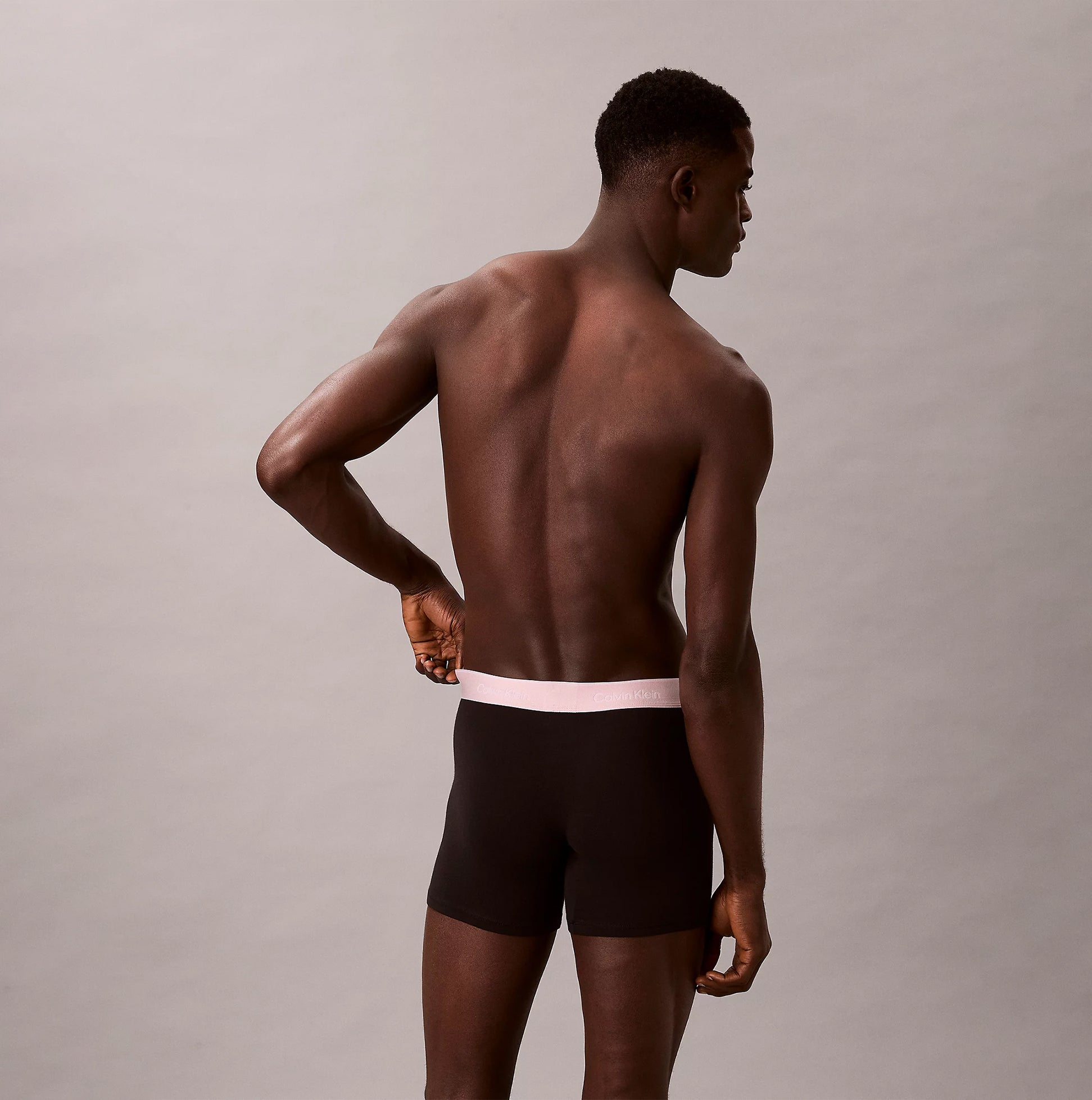 Calvin Klein BOXER BRIEF 3 Pack Mens Cotton Stretch Black rear view on model showcasing fit and design.