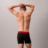Calvin Klein BOXER BRIEF 3 Pack Mens Microfibre Stretch Black back view on model, showcasing waistband detail.