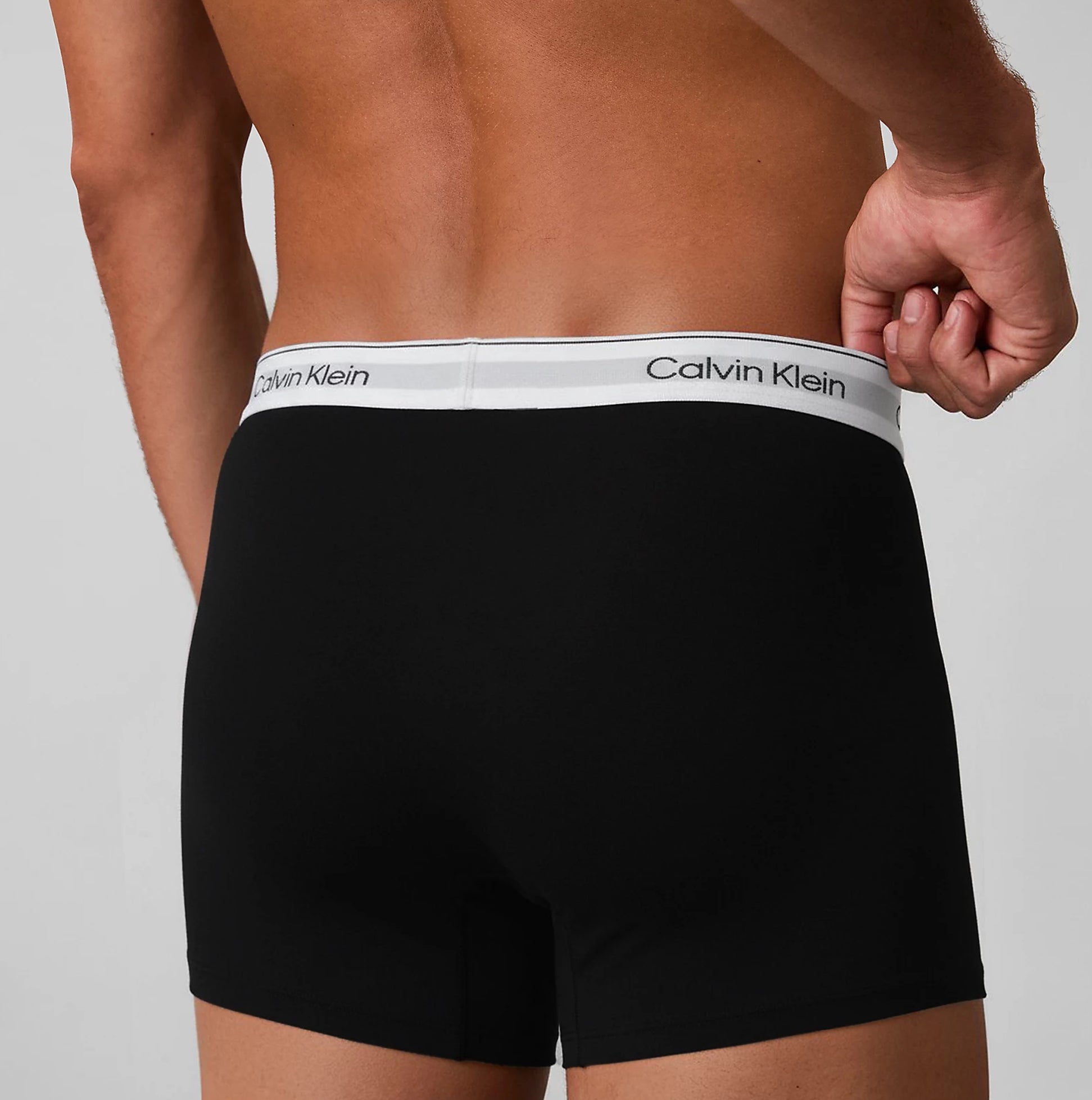 Calvin Klein RELAXED FIT 3 Pack Mens Trunks Multicoloured rear view showing black trunk design with logo waistband.