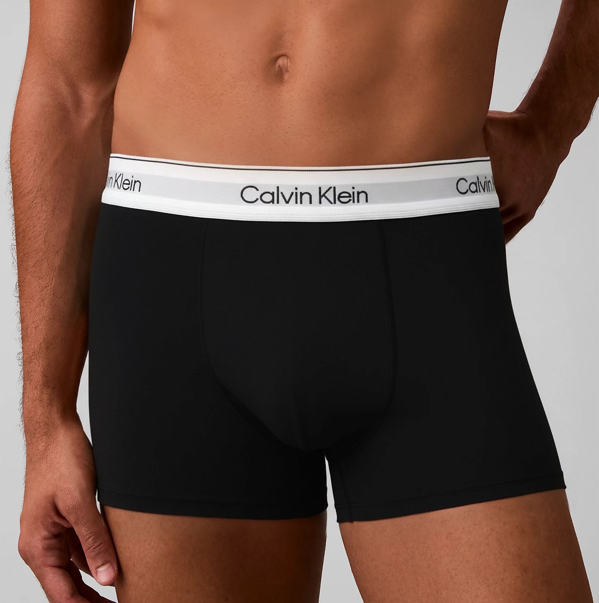 Calvin Klein RELAXED FIT 3 Pack Mens Trunks Multicoloured side view, black trunks with logo waistband.