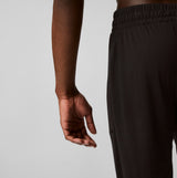 Calvin Klein ULTRA SOFT MODAL Mens Lounge Bottoms Black side view showing waistband and hand detail.