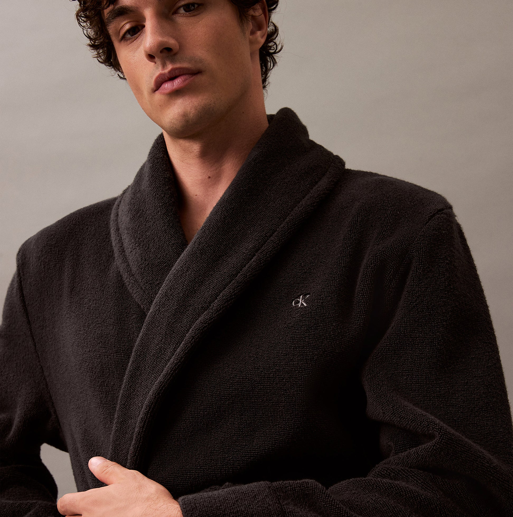 Calvin Klein COMFORT FRENCH TERRY Mens Bathrobes Black front view, featuring a model wearing a cozy black bathrobe.