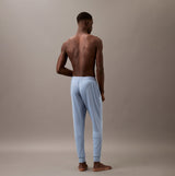 Calvin Klein ULTRA SOFT MODAL Mens Lounge Joggers Faded Denim back view on model.