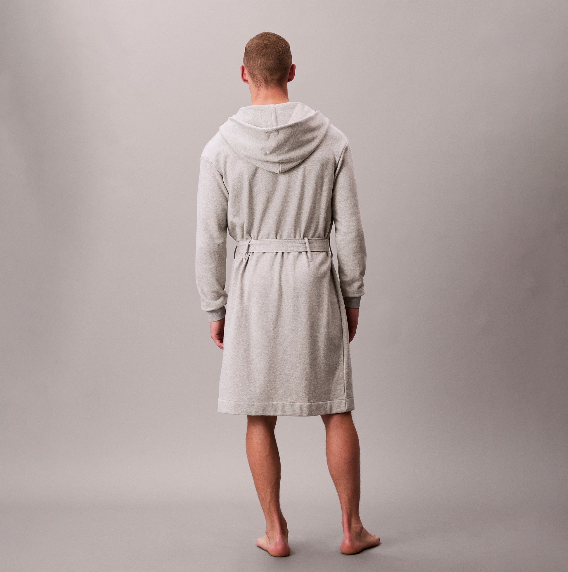 Calvin Klein HOODED ROBE Mens Bathrobes Grey Heather back view of the robe in grey heather color on a male model.