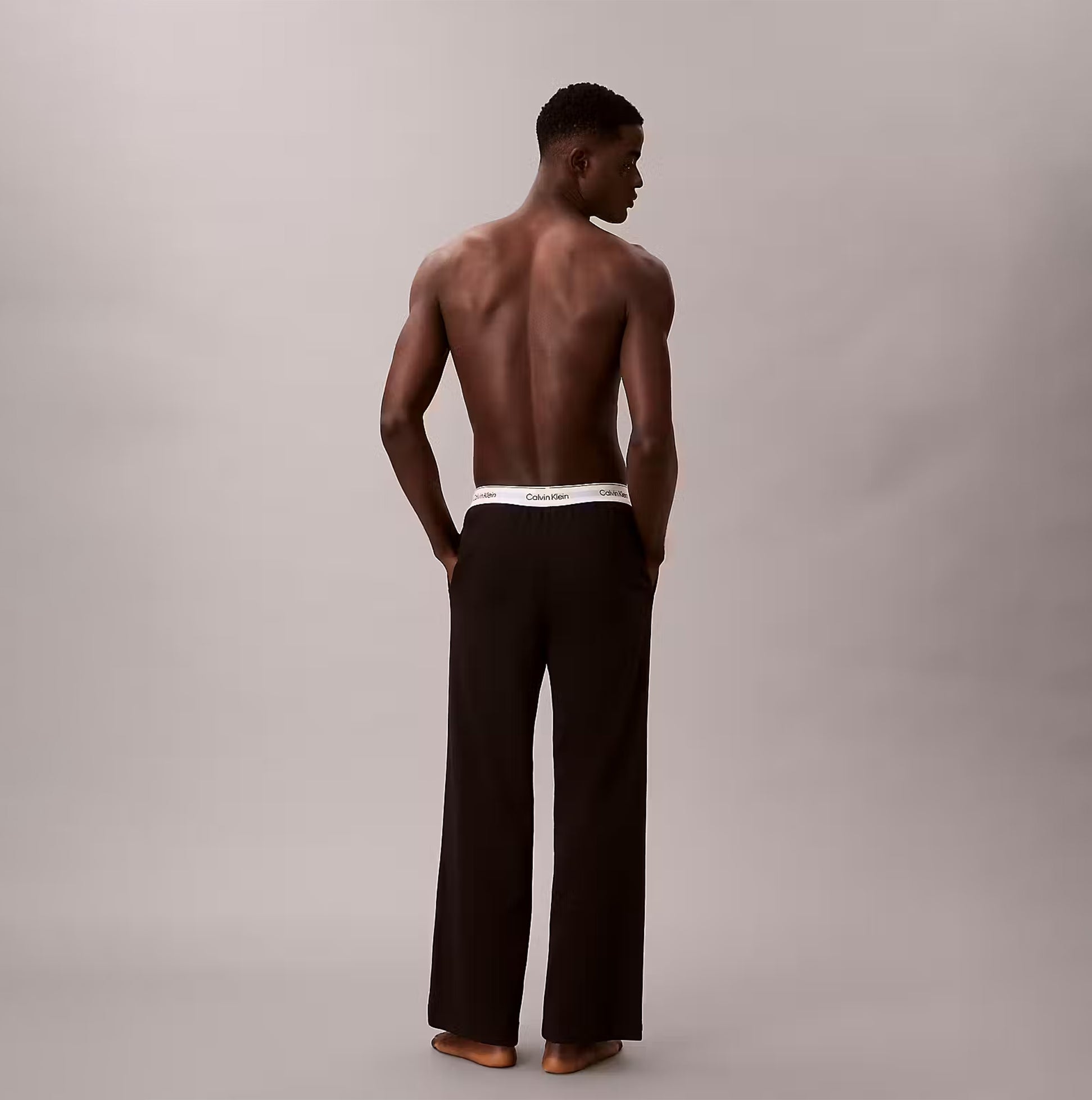 Calvin Klein LS TEE PANT SET Mens Black back view showcasing the stylish pants and logo waistband detail.