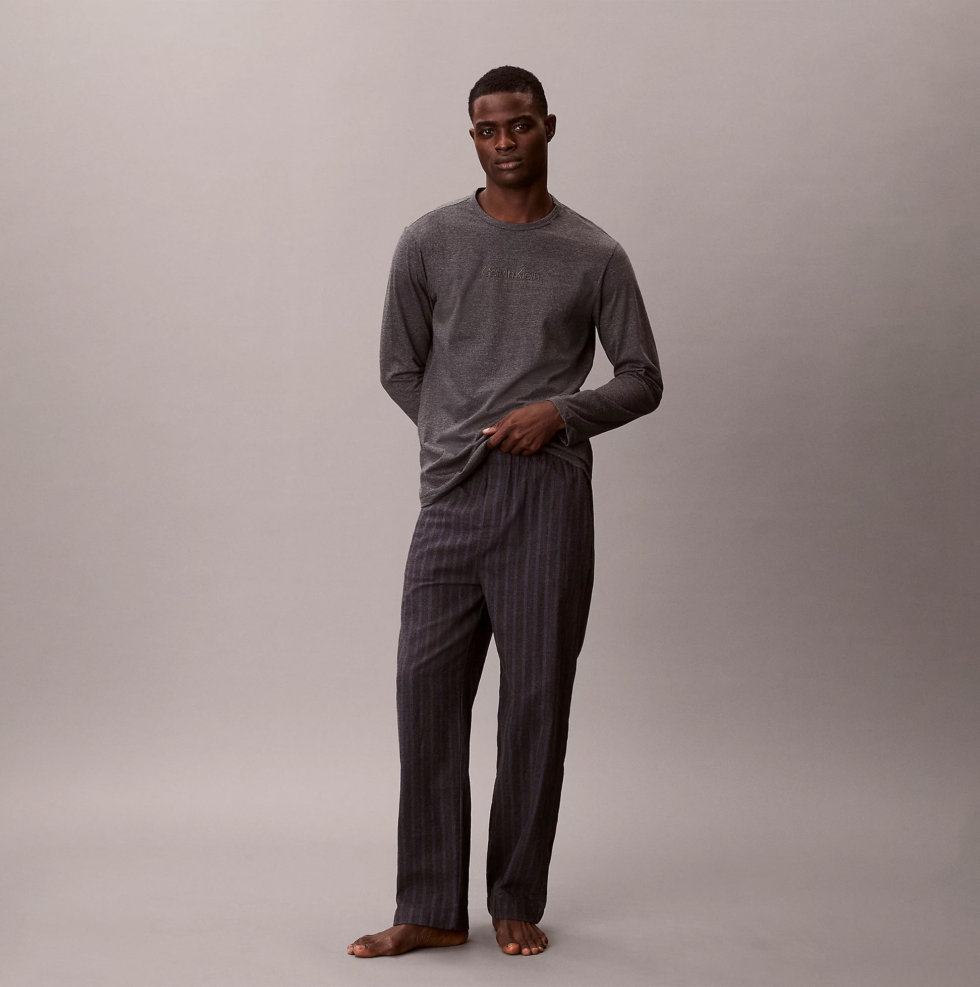 Calvin Klein LS TEE PANT SET Mens Multicoloured front view showcasing long-sleeve tee and striped pants.