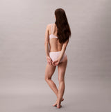 Calvin Klein BIKINI 3 PACK Womens Seamless Bikini Multicoloured back view on model, showcasing fit and design.