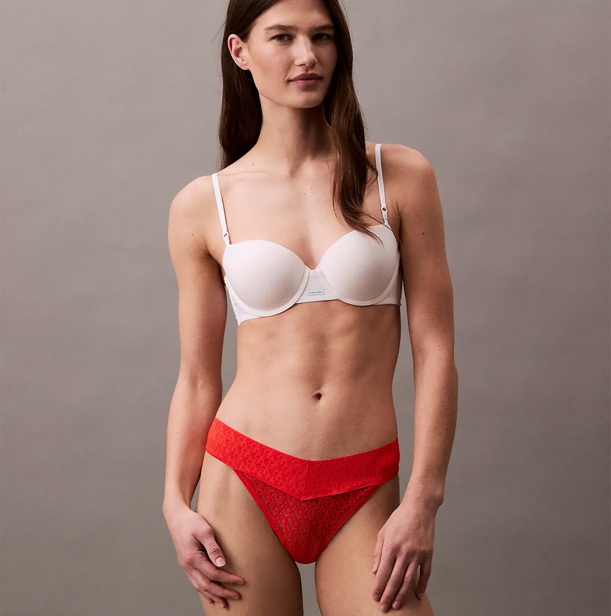 Calvin Klein THONG Womens Icon Logo Lace Molten Red side view model wearing lace thong and bra
