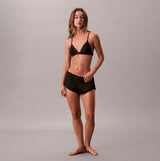 Calvin Klein TAPSHORT Womens Shorts Black front view on model, stylish and comfortable, perfect for casual wear.