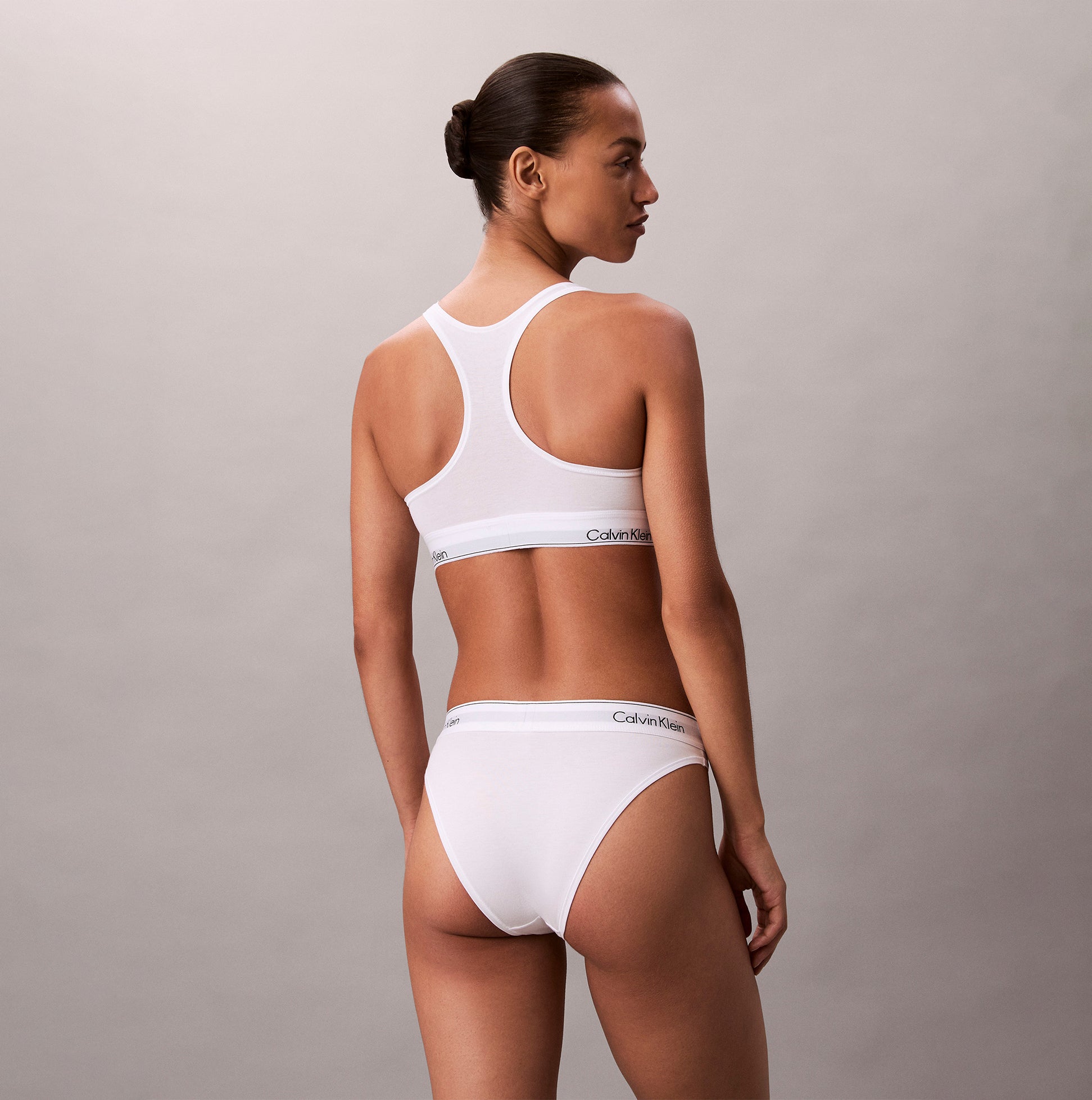 Calvin Klein Icon Cotton Modal Womens Unlined Bralette White back view showcasing the sleek design and comfortable fit.
