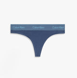 Calvin Klein Icon Cotton Modal Womens Thong Denim front view showing blue color and logo detail on waistband.