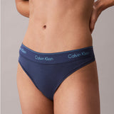 Calvin Klein Icon Cotton Modal Womens Thong Denim side view featuring navy blue color and signature logo waistband.