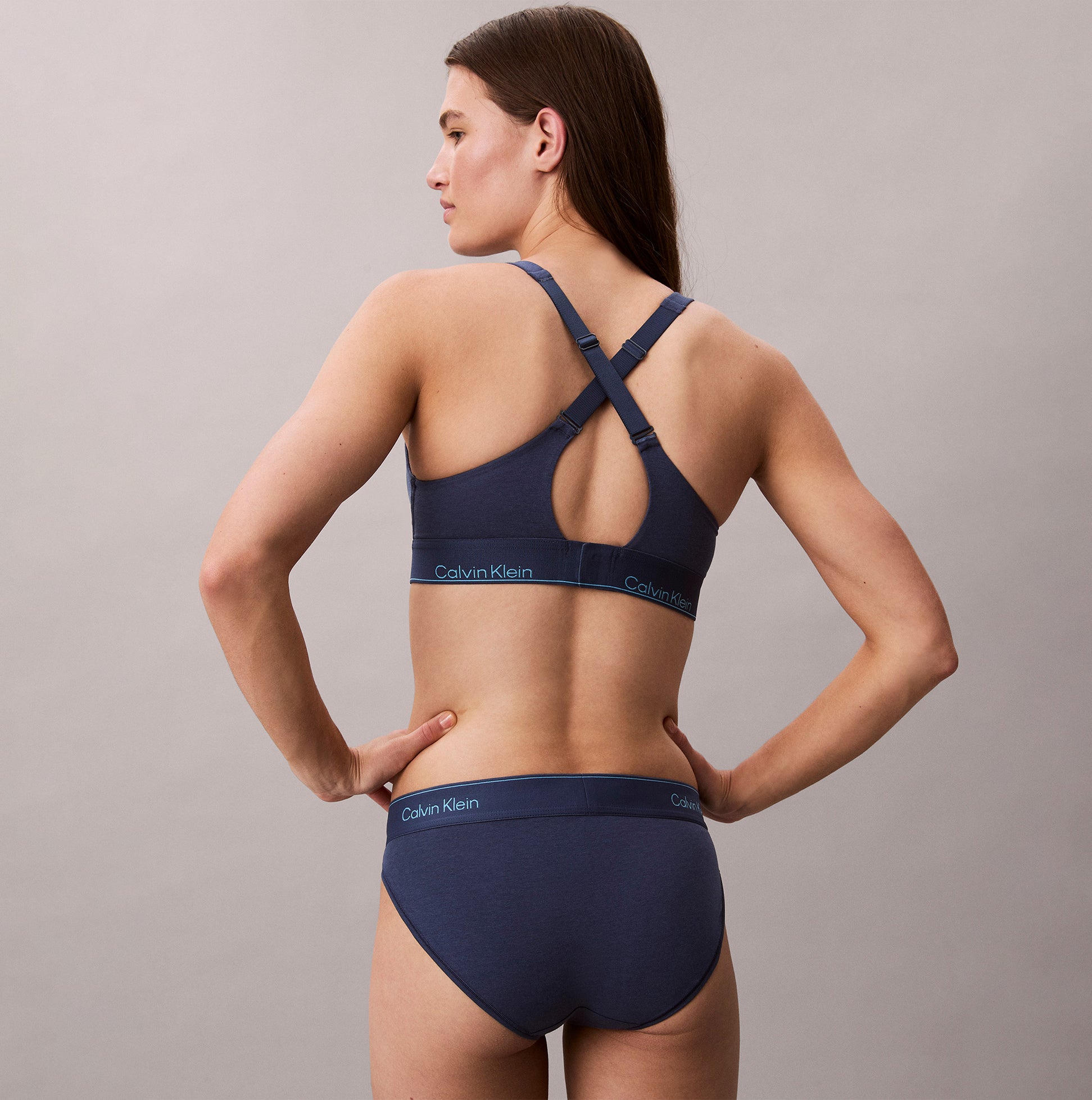 Calvin Klein Icon Cotton Modal Womens Bikini Brief Denim back view model wearing navy underwear set