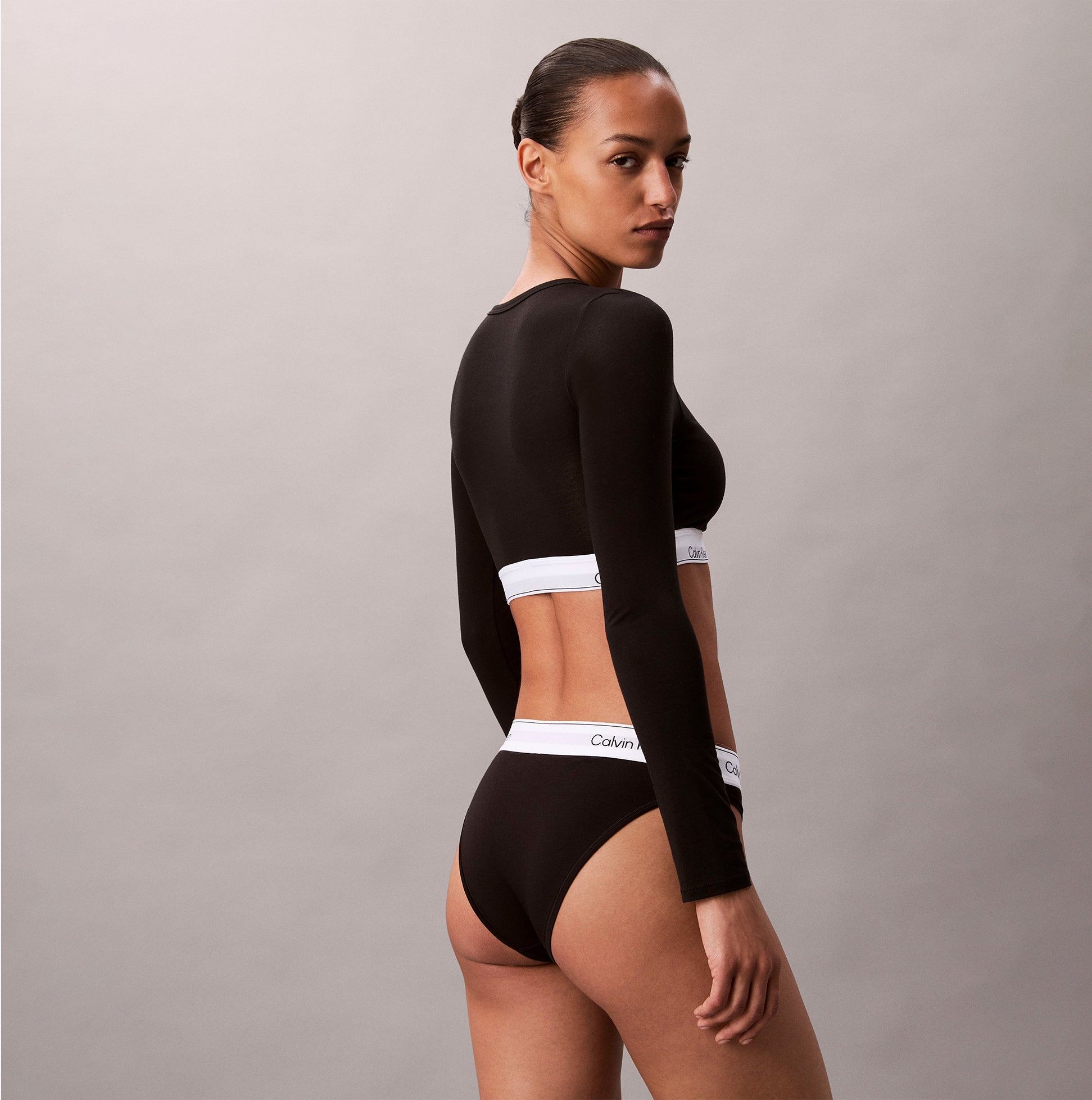 Calvin Klein Icon Cotton Modal Womens Long Sleeve T-shirt Bralette Black side view showing model wearing the bralette.