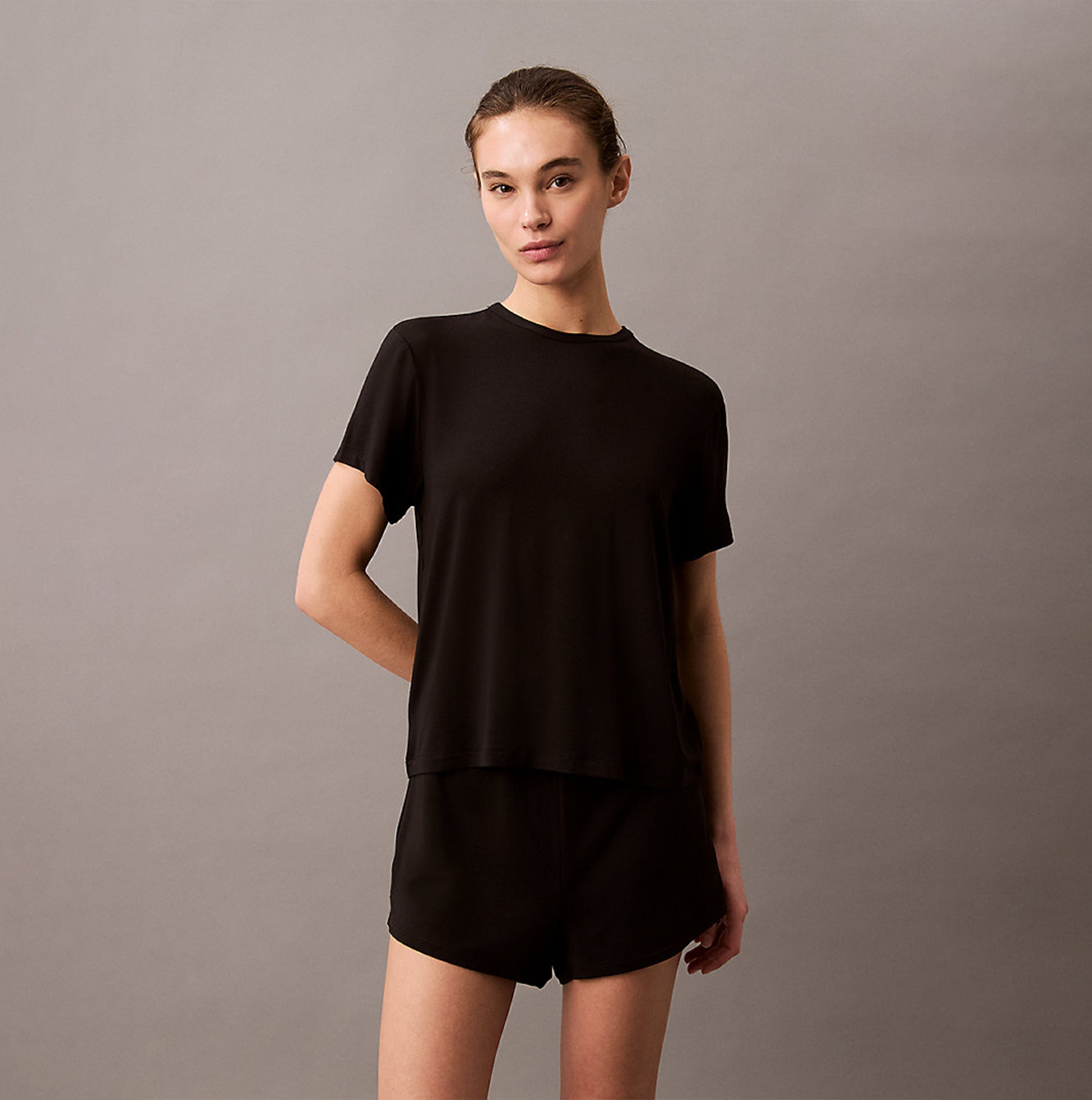 Calvin Klein ULTRA SOFT MODAL Womens Lounge T-Shirt Black front view, relaxed fit and short sleeves, elegant design.