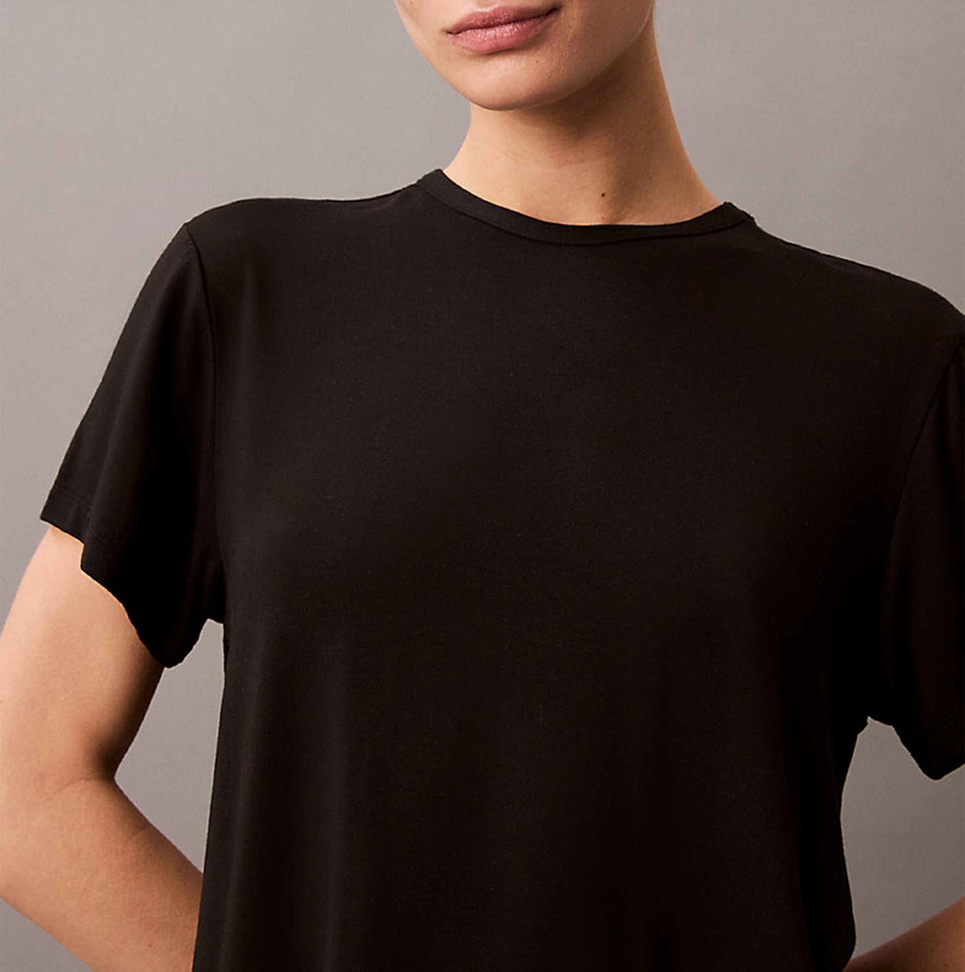 Calvin Klein ULTRA SOFT MODAL Womens Lounge T-Shirt Black front view detail, showcasing crew neckline and short sleeves.