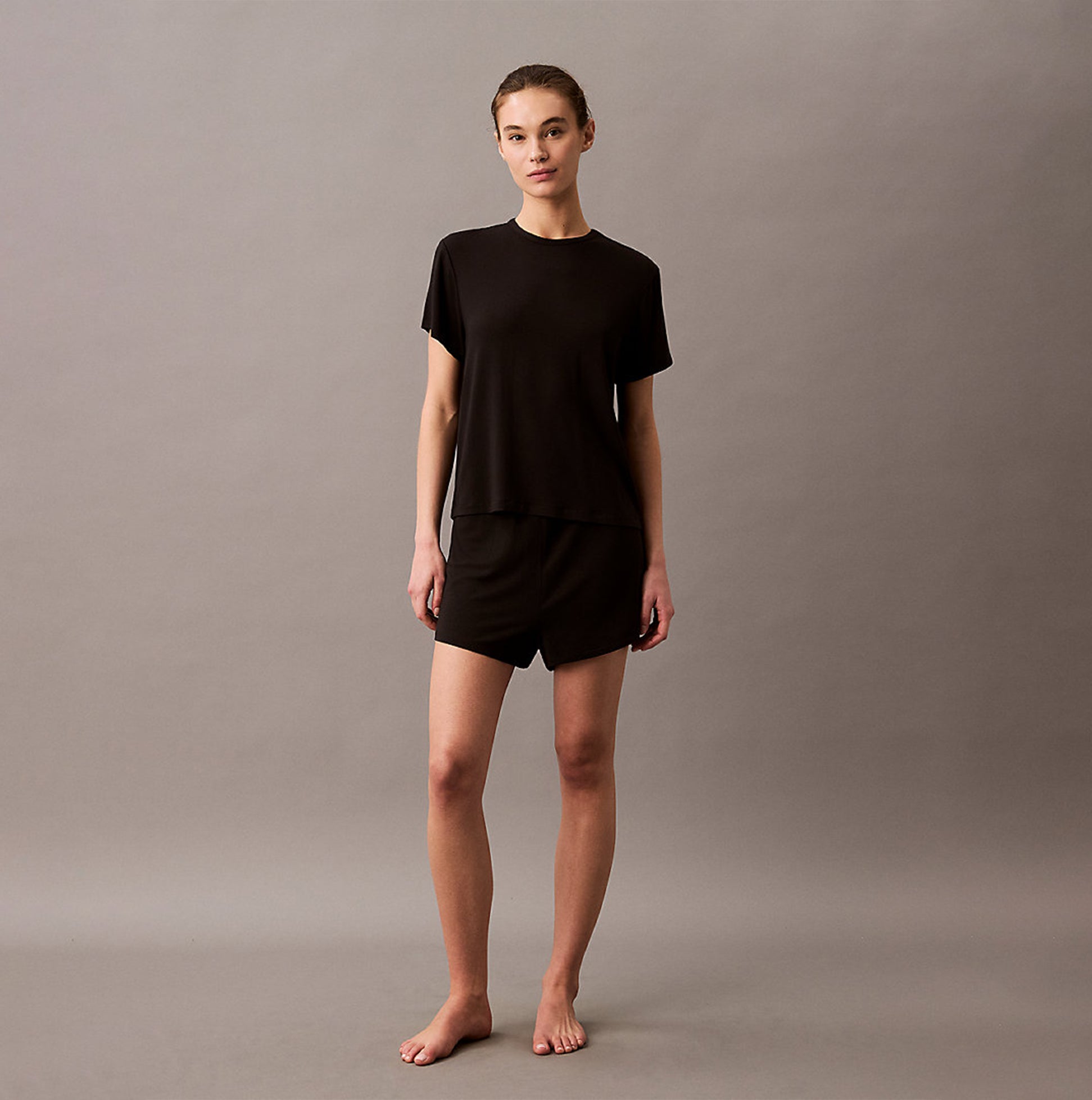 Calvin Klein ULTRA SOFT MODAL Womens Lounge T-Shirt Black front view on model wearing matching shorts.