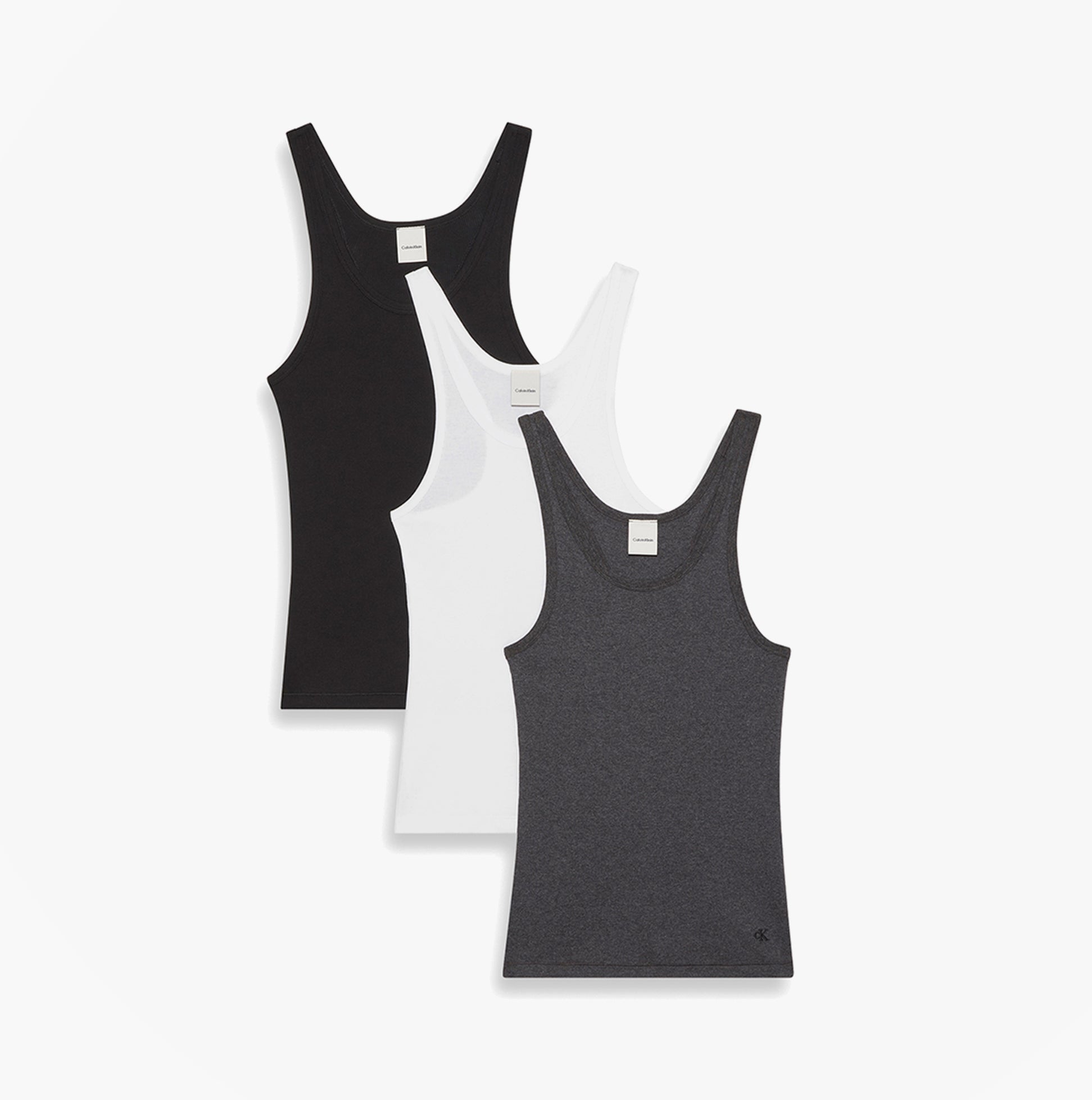 Calvin Klein SCOOP NECK COTTON TA Womens T-Shirts & Tank Tops Multicoloured front view of three sleeveless tank tops in black, white, and gray.