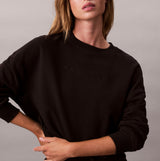 Calvin Klein Womens Long Sleeve Pyjama Top Black front view, showcasing soft cotton material and casual style.