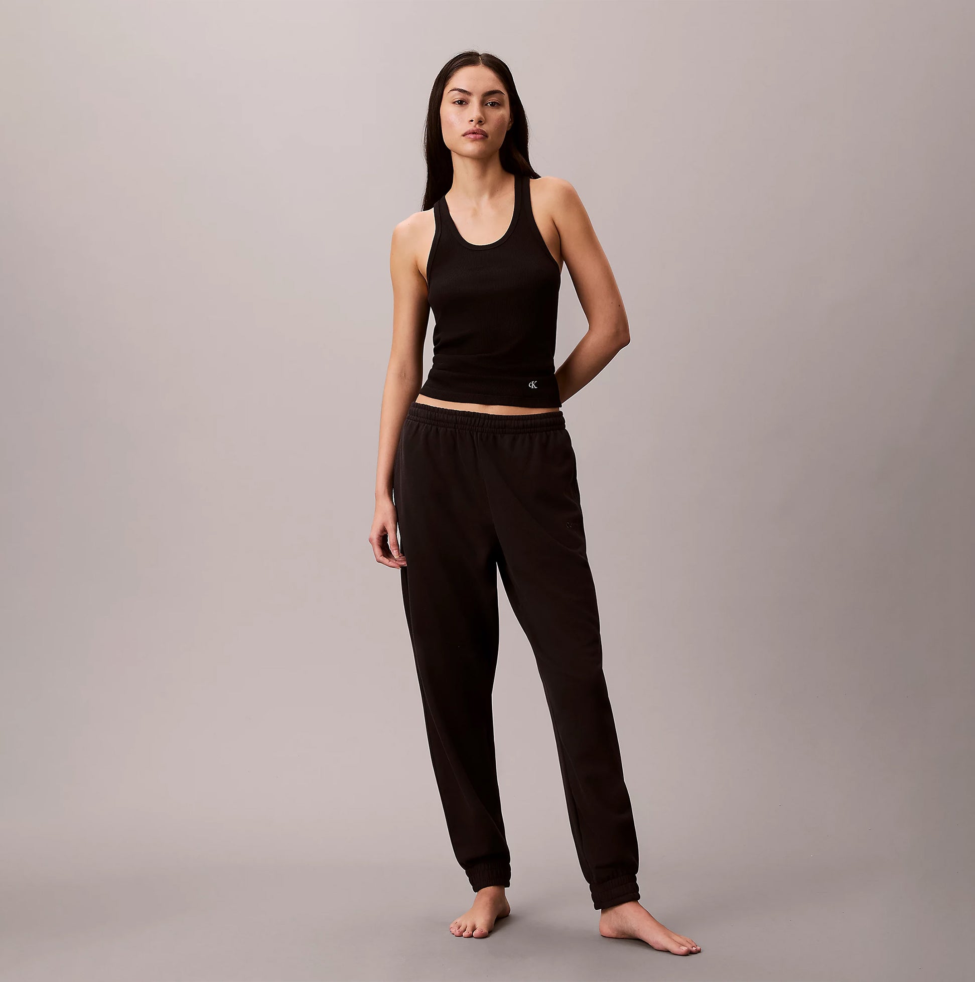 Calvin Klein JOGGER Womens Black front view showcasing stylish jogger pants and tank top.