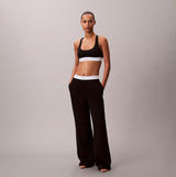 Calvin Klein LOGO JERSEY PANT Womens Black front view model showing stylish design and comfortable fit.