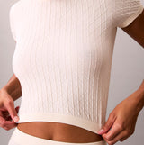 Calvin Klein SEAMLESS TEE Womens Printed CK Knit T-Shirt Ivory, detail view showcasing fabric texture and fit.