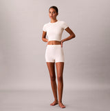 Calvin Klein SEAMLESS TEE Womens Printed CK Knit T-Shirt Ivory front view, showcasing ribbed texture and fitted style.