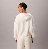Calvin Klein PLUSH HOODIE. Womens Ivory, back view showing soft material and hood design.