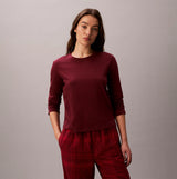 Calvin Klein LS TEE FLANNEL PANT Womens Pant Set Red front view showing model wearing red top and red plaid pants.